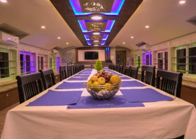 Houseboat Day and Night Package - View of Pournami Four Bedroom Houseboat Dining Area at Night