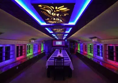 View of Pournami Premium Houseboat Dining Hall during night - Day and Night Houseboat Package